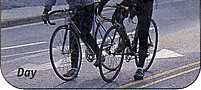 Cyclists wearing reflective garments, by day (4983 bytes)