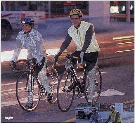 Cyclists wearing reflective garments, at night (35695 bytes)